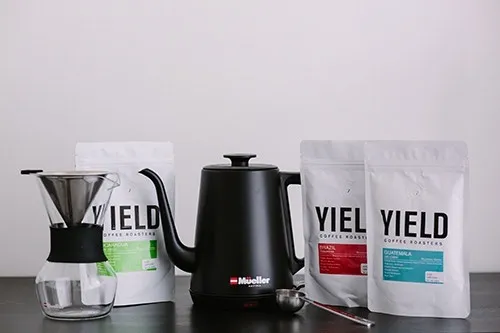Coffee tasting supplies arranged as an activity kit